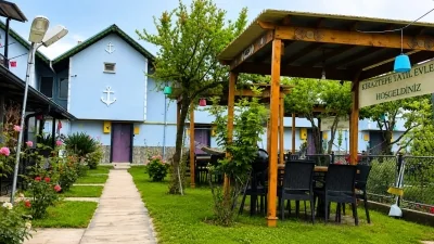 Kiraztepe Tatil Evleri yeşil bahçe